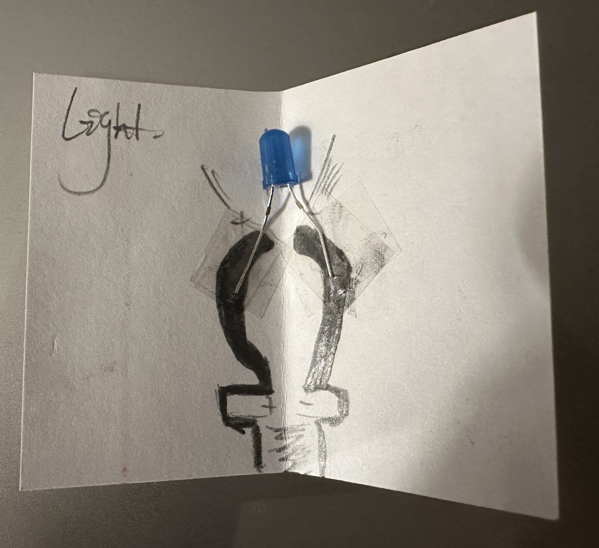 I taped the LED onto the connection point that I had left in the drawing.