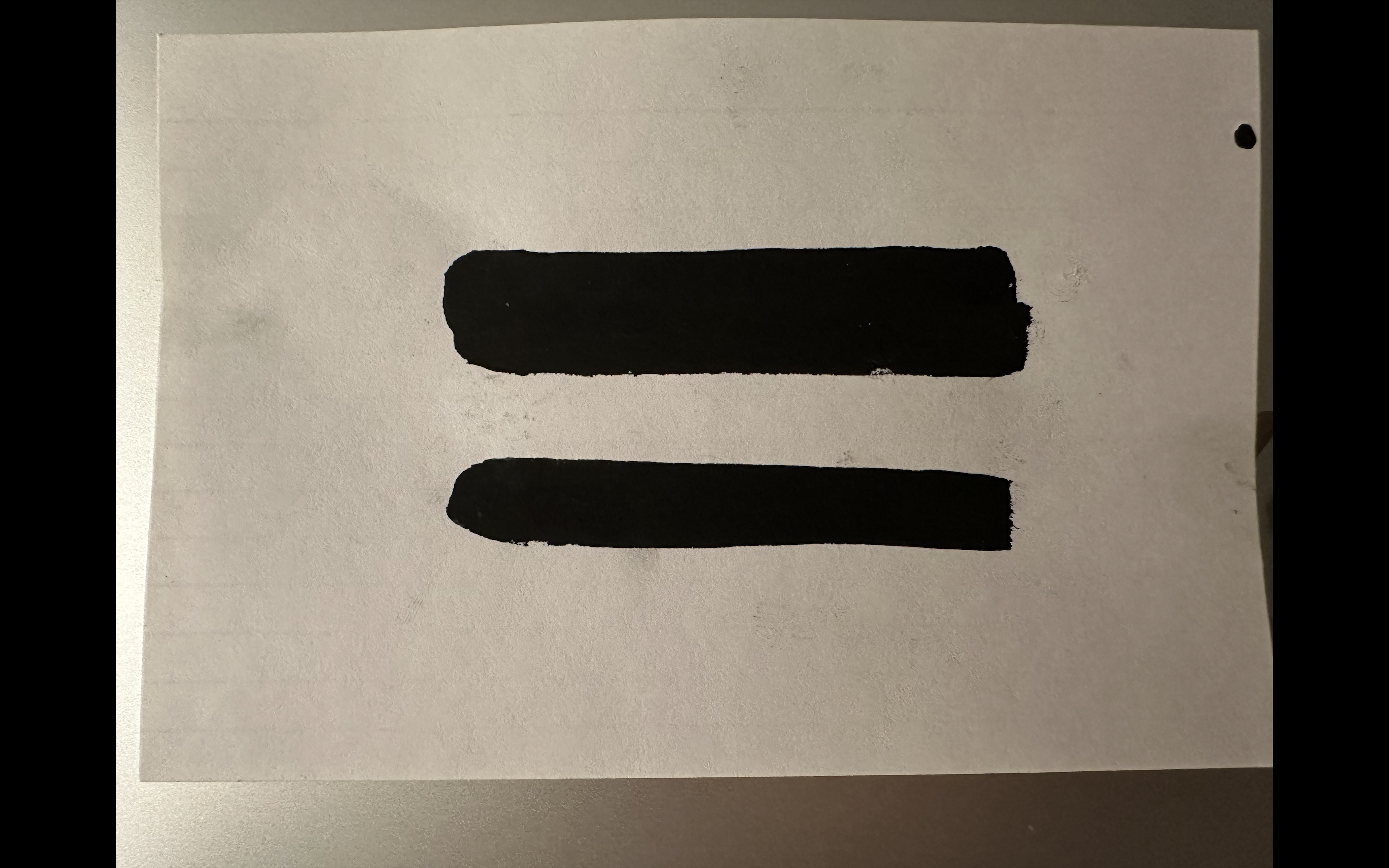 In this image, I used conductive paint in class to draw two lines as a circuit.