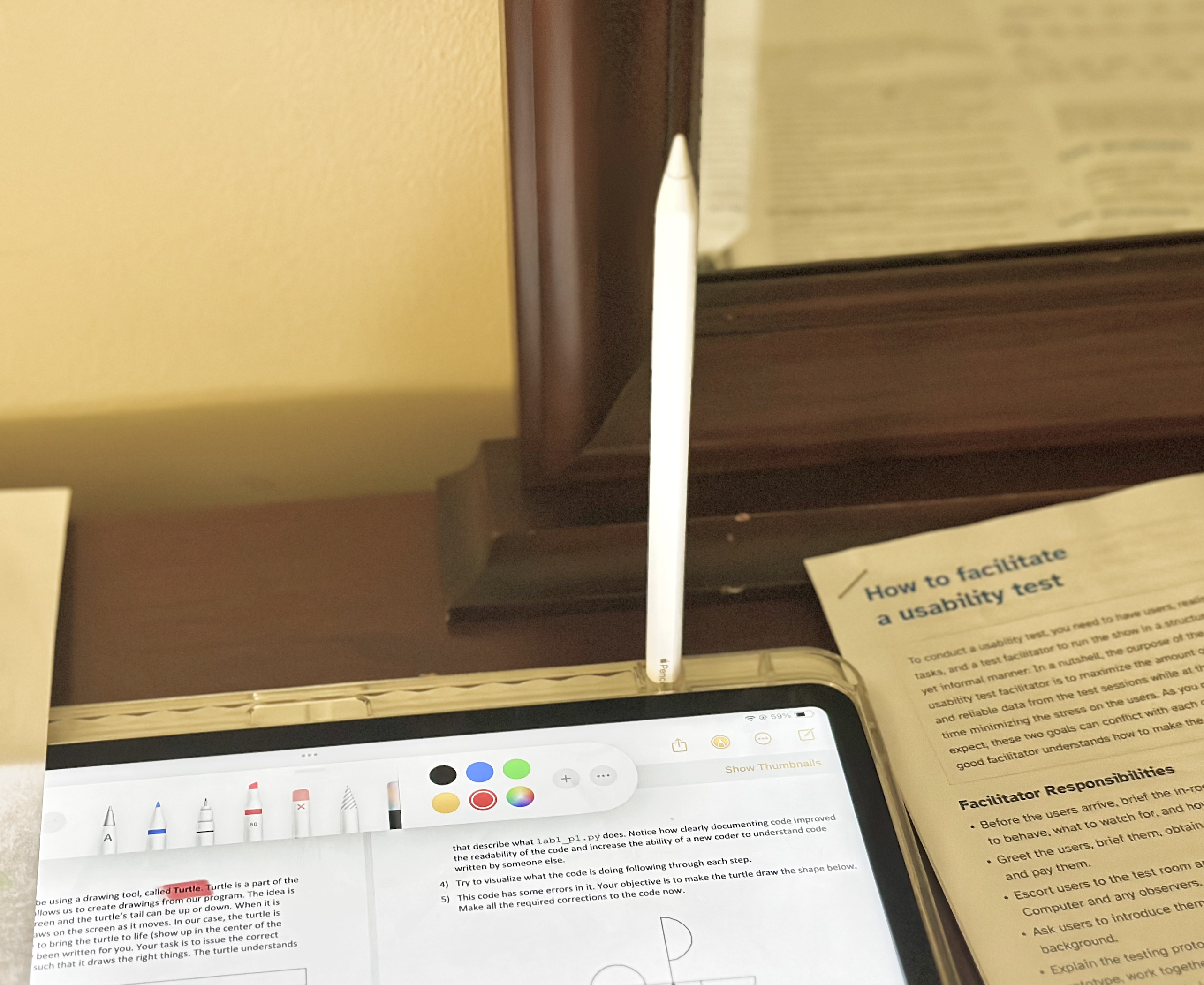 The Apple Pencil fully inserted into the slot and standing upright